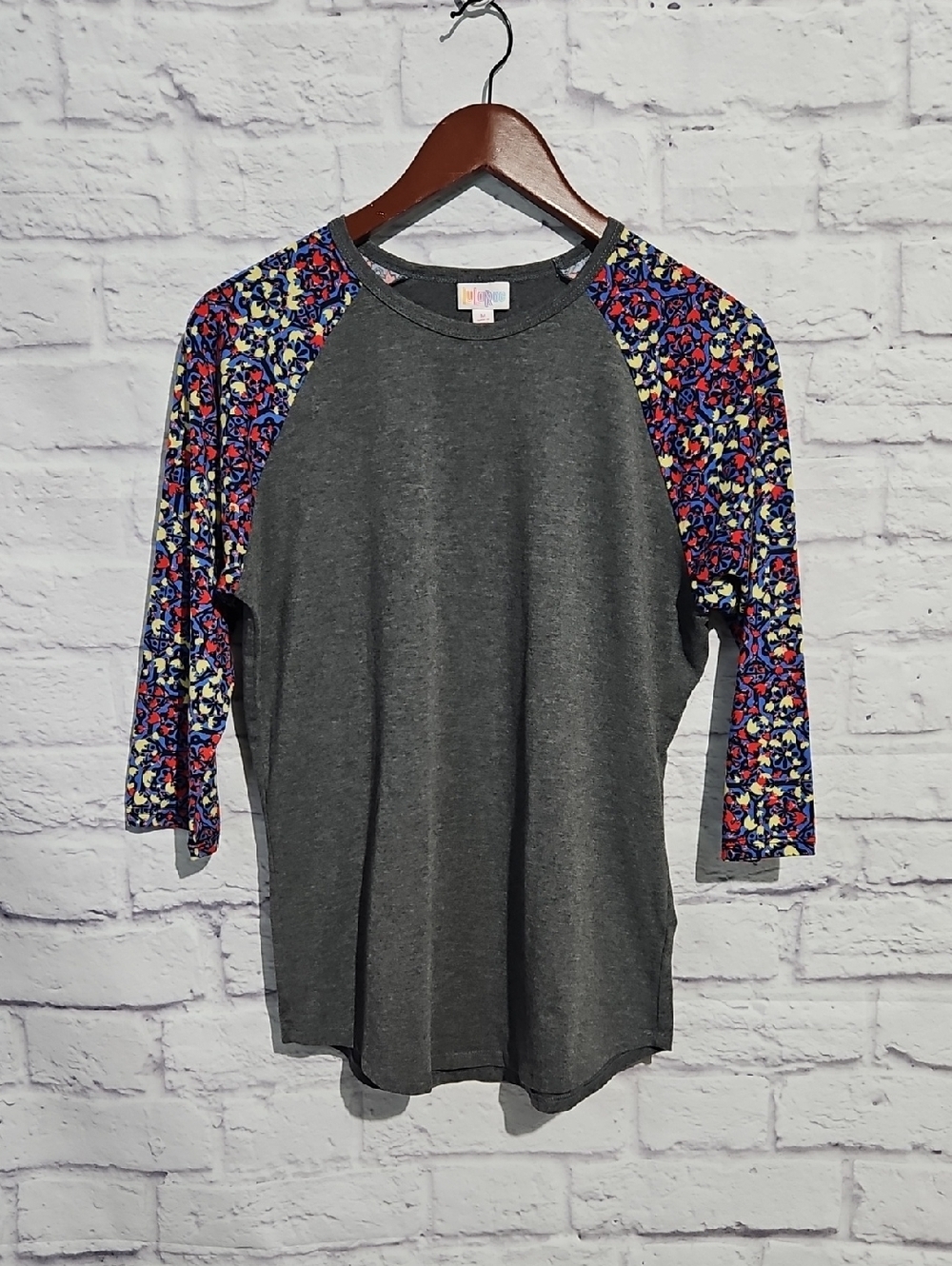 LuLaRoe Randy Charcoal Raglan Top with Blue, Red & Yellow Floral Sleeves